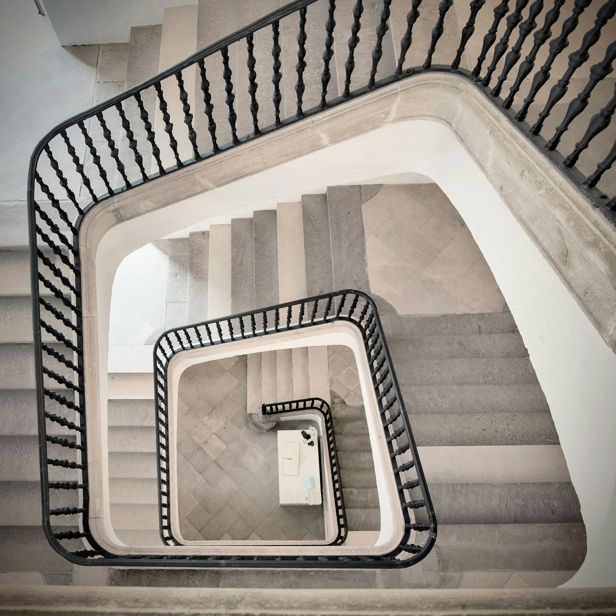 A top-down view of a beautiful spiral staircase showcasing elegant geometry and perspective.